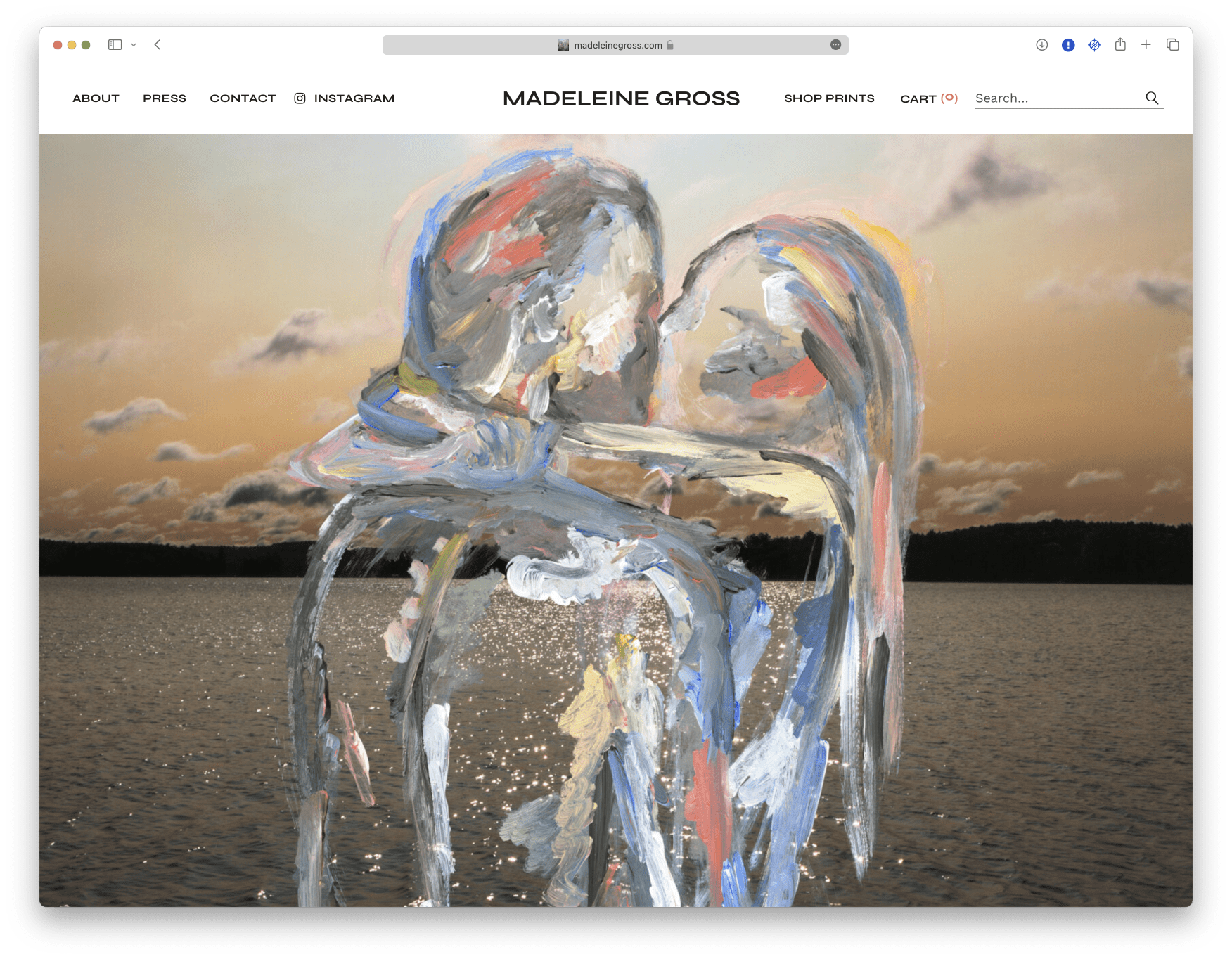 A website with two people hugging in front of a body of water.